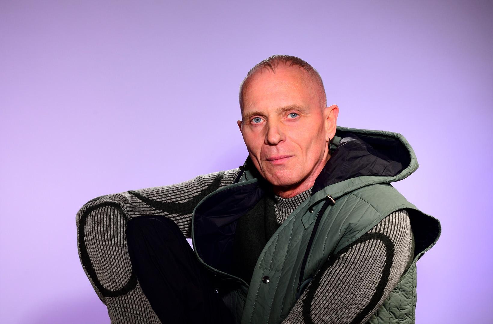 Mr C from the Shamen in an elaborate hoody