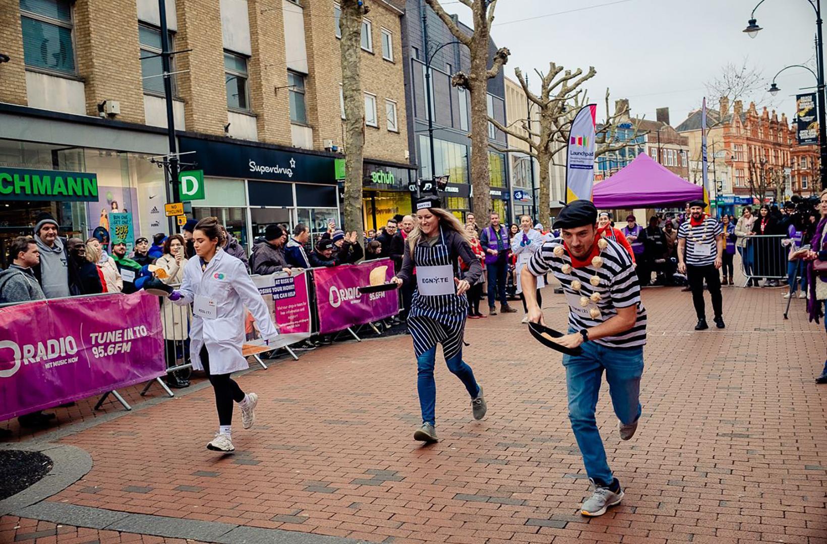 Launchpad’s annual Pancake Race which saw teams batter it out on Broad Street