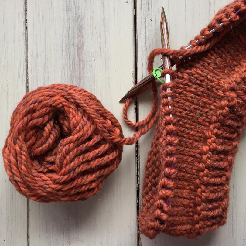 in progress brown knitting 