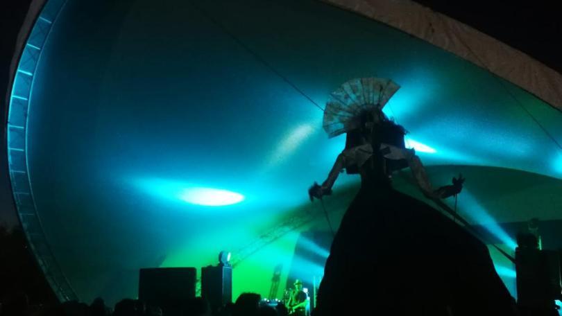 puppet in a tent with disco lights