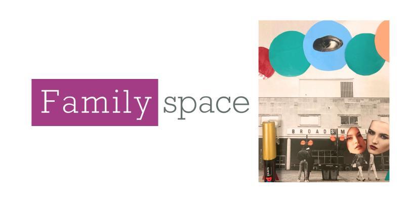 children holding up colourful artwork