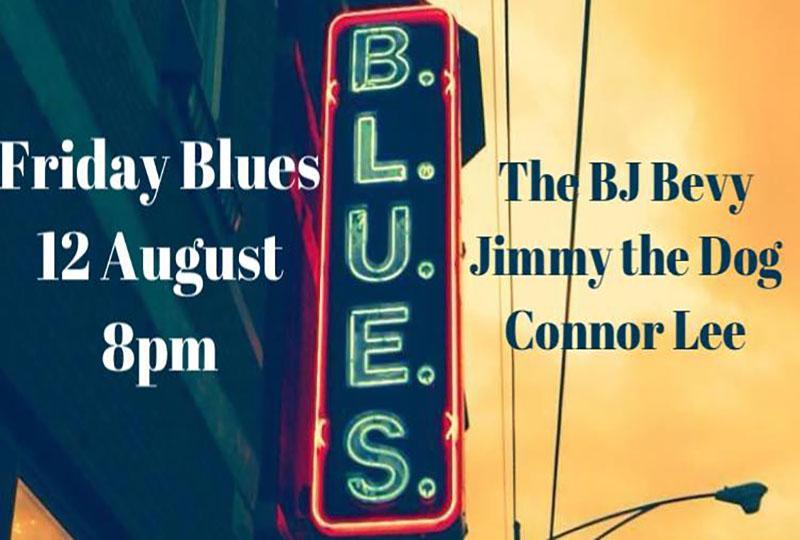 Image of a neaon sign spelling the word BLUES