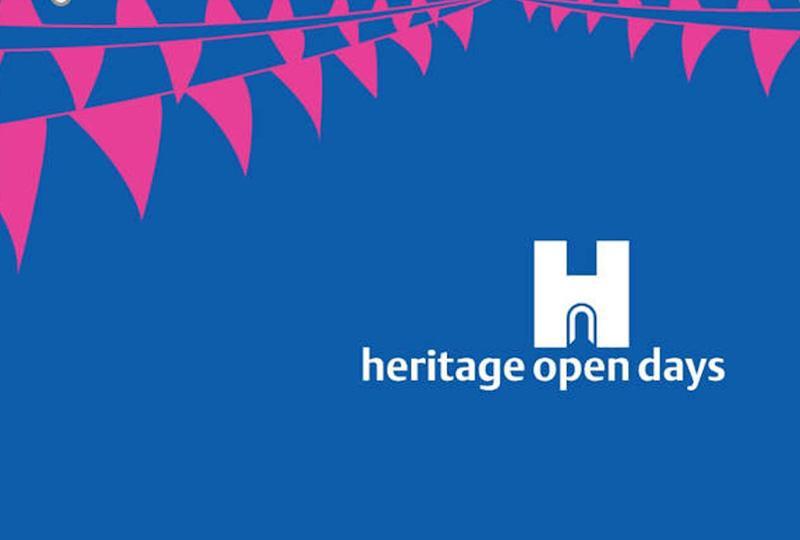 Heritage Open Days logo white on blue with pink bunting