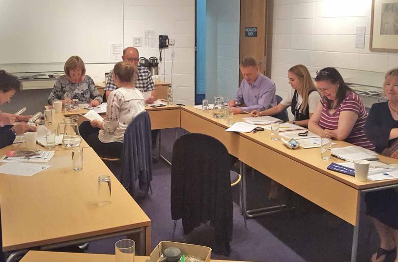 Image of people on a handwriting workshop at Berkshire Record Office