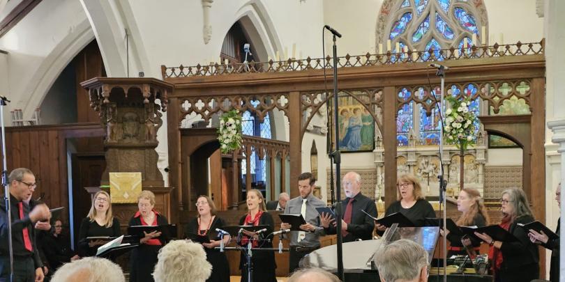 Chorate Chamber choir performing in a church