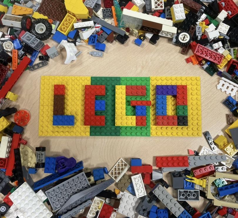 Image of the word LEGO made out of coloured LEGO bricks. 