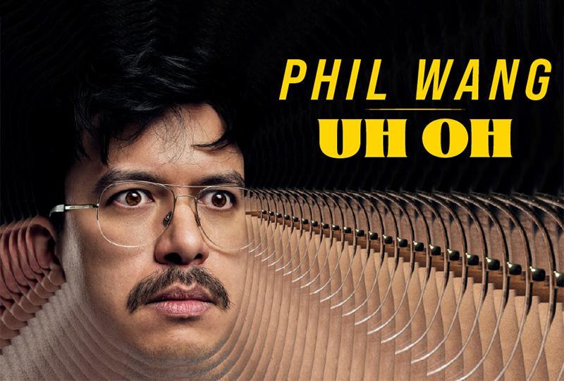 Photo of comedian Phil Wang's face, with a digital effect on the edges so it looks like the camera is zooming in very fast. Yellow text overlaid onto the image reads 'Phil Wang Uh Oh'.