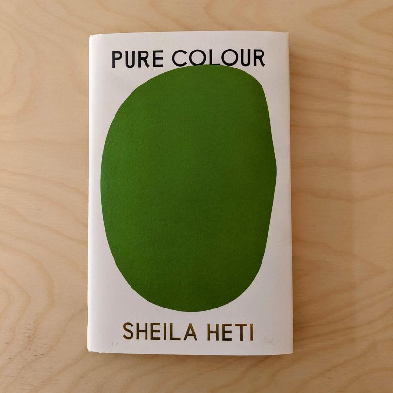 book cover - pure colour by Sheila Heat. Text with a green oval.