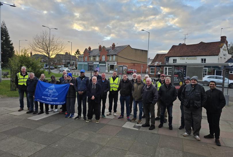 Members of Reading Men Walking and Talking (MWAT) group standing in a line