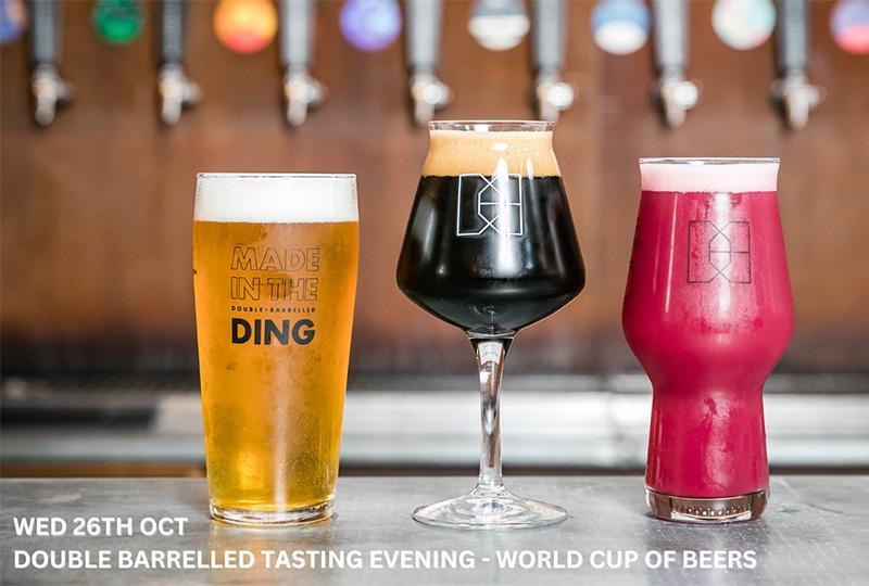 Three Double-Barrelled beers of different sizes and colours on a bar