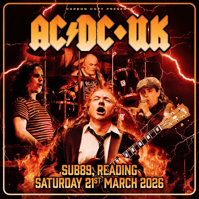 poster for AC/DC UK featuring band members against a red background
