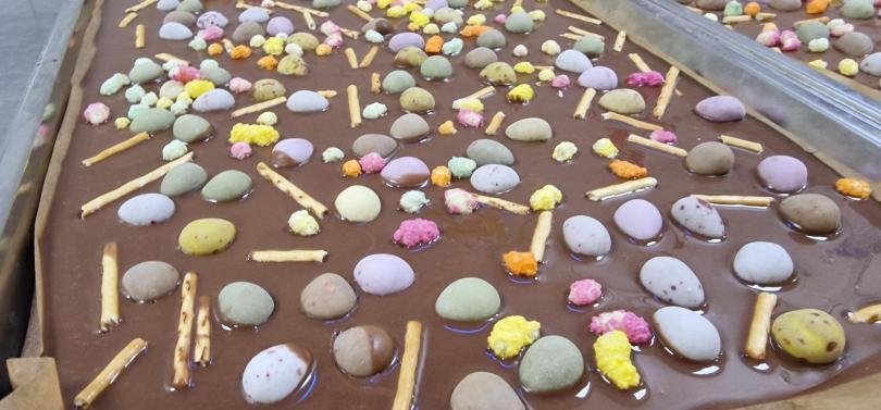large slab of chocolate with mini-eggs in it