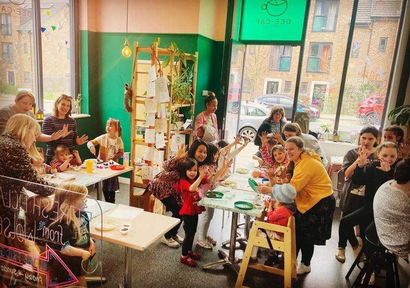 Group of children and adults at a workshop