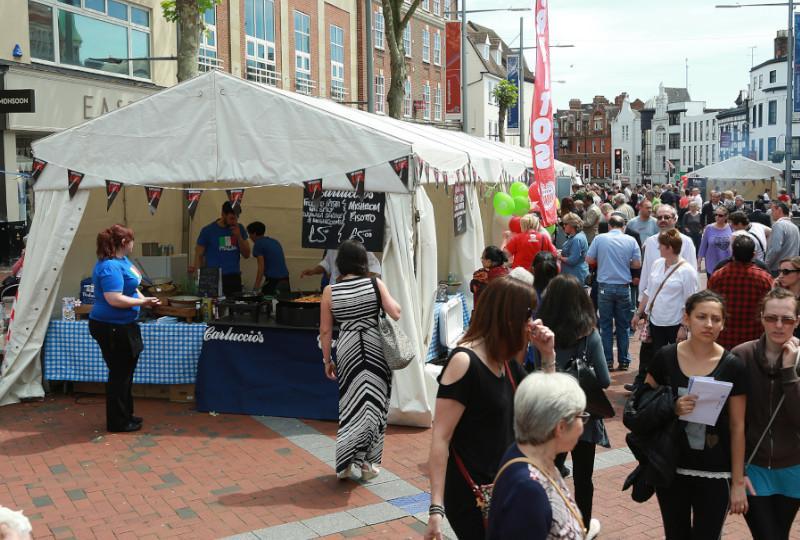 Food stalls and crowds on Broad Street in Reading