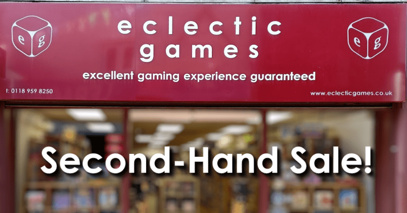 front of eclectic games with second-hand sale written on it