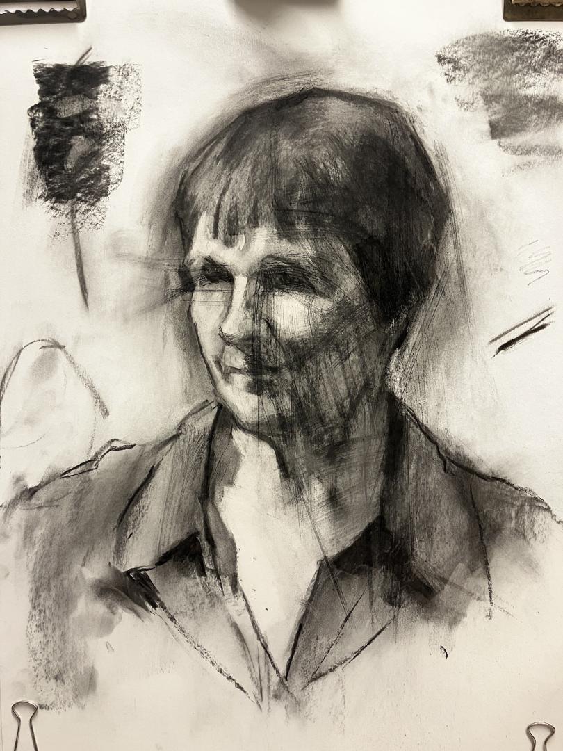 charcoal drawing of a woman with short hair wearing a short