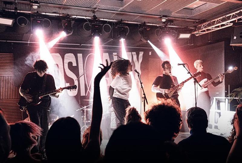 The band Josi & Alex performing on stage