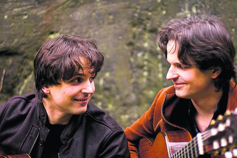 Identical twins Peter and Zoltan Katona, two Spanish men with dark hair