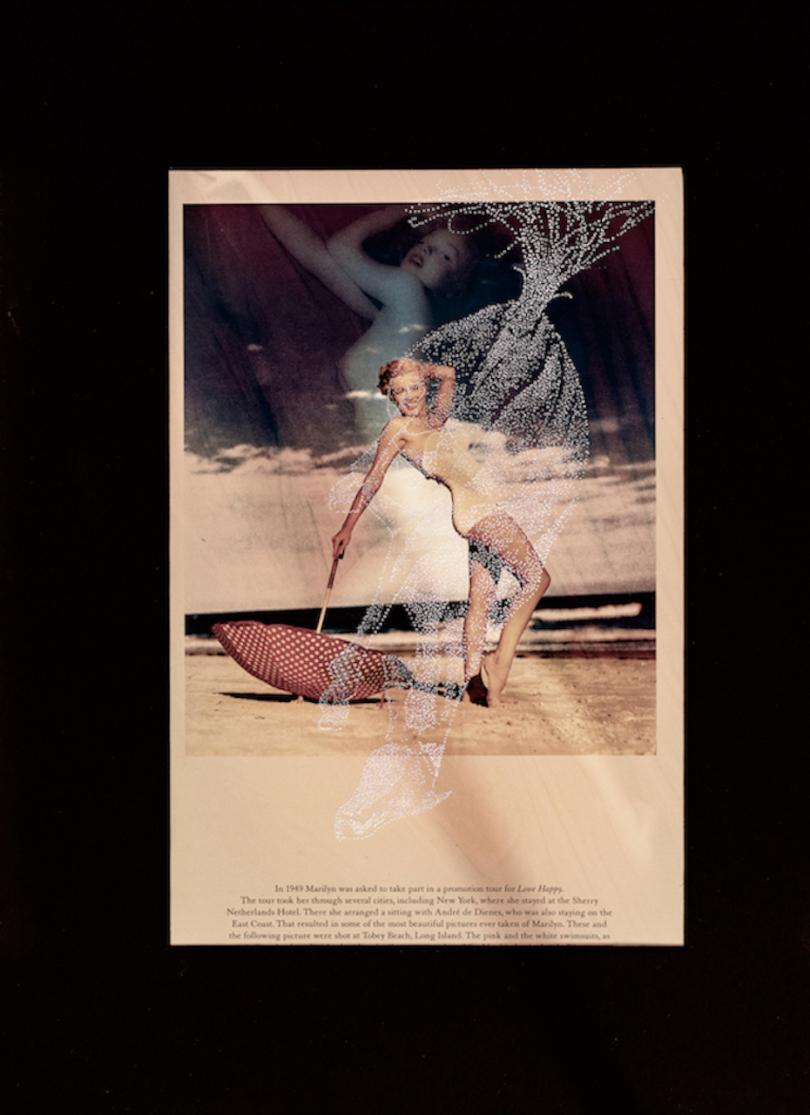 vintage poster with sewn design on top