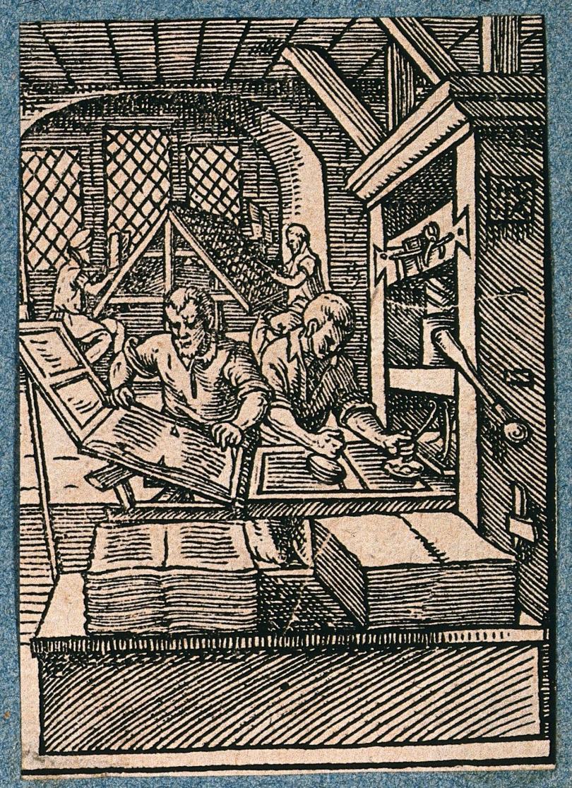 Printers working at a printing press, and setting type. 