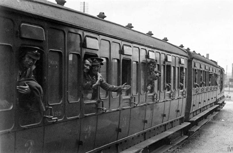 troops on a train waving goodbye