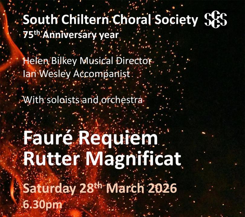 Cocnert poster with details of the event in front of an image of flames and sparks