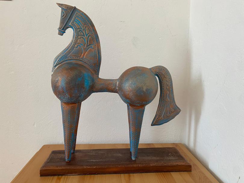 Copper-effect horse sculpture