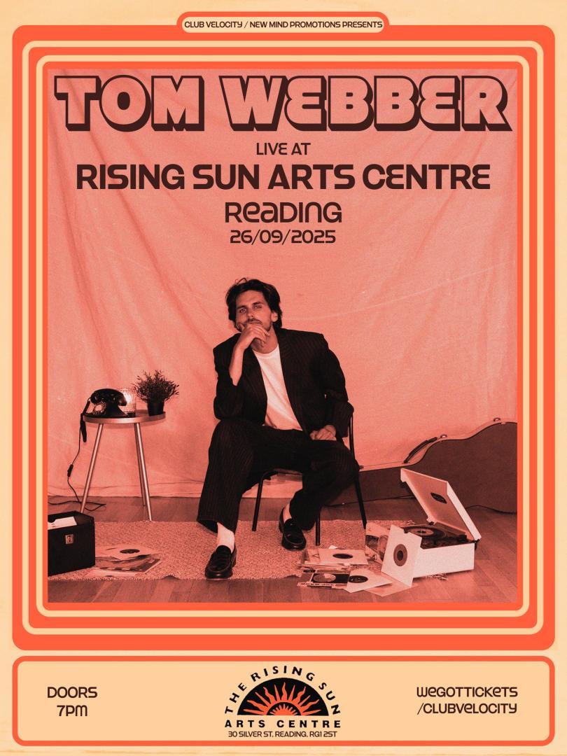 Tom Webber gig poster featuring Tom wearing a black suit with white t-shirt sitting amongst a vintage record player and a guitar case