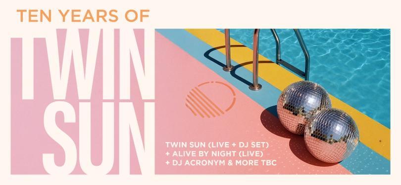 Disco balls by the side of a swimming pool