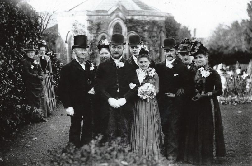 Victorian wedding photograph showing the wedding party in front of Sulham Church.