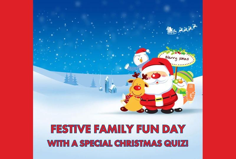 Cartoon image of Santa, Rudolph and asnowman against a snowy backdrop