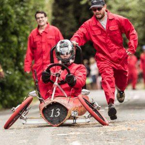 Box Kart team trying to keep their Kart moving