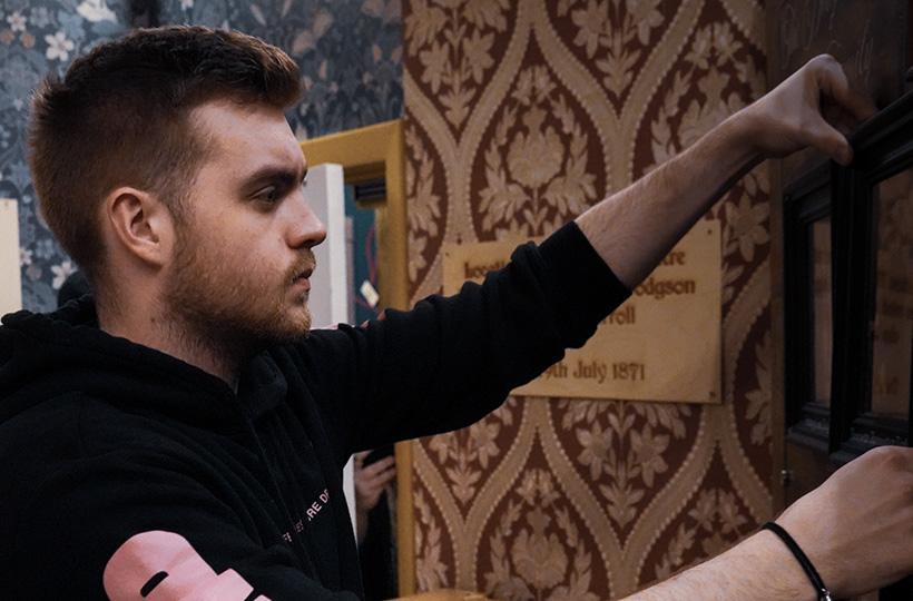 Man playing Curiouser & Curiouser at TimeTrap Escape Room in Reading