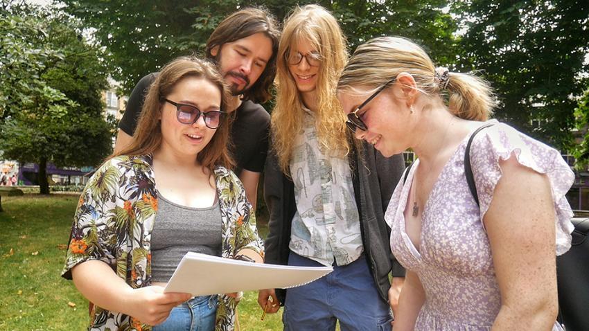 Friends playing Professor Pooch’s Adventure in Reading town centre