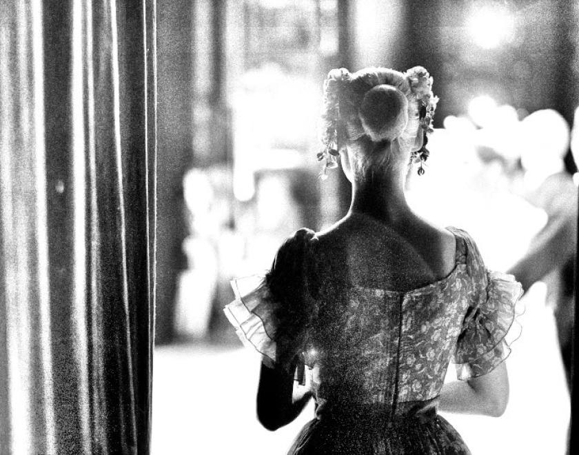 actress looking out on stage