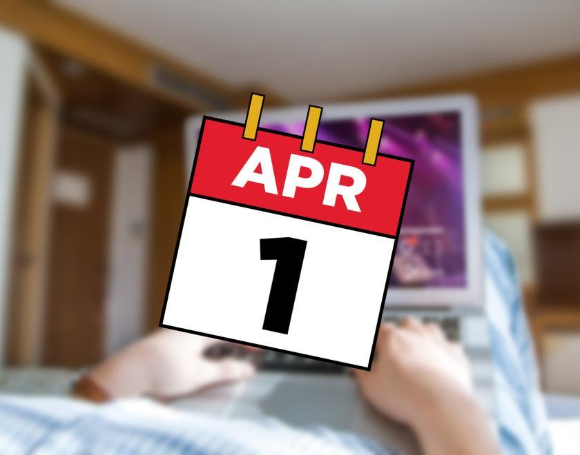 April 1st calendar graphic superimposed over an image of someone using a laptop