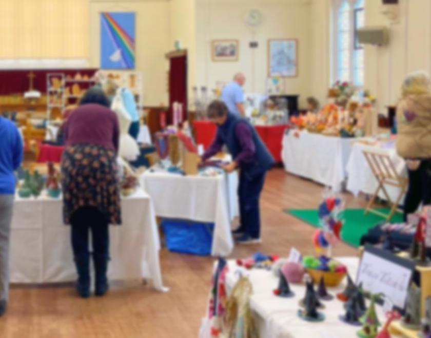shoppers browsing an art market