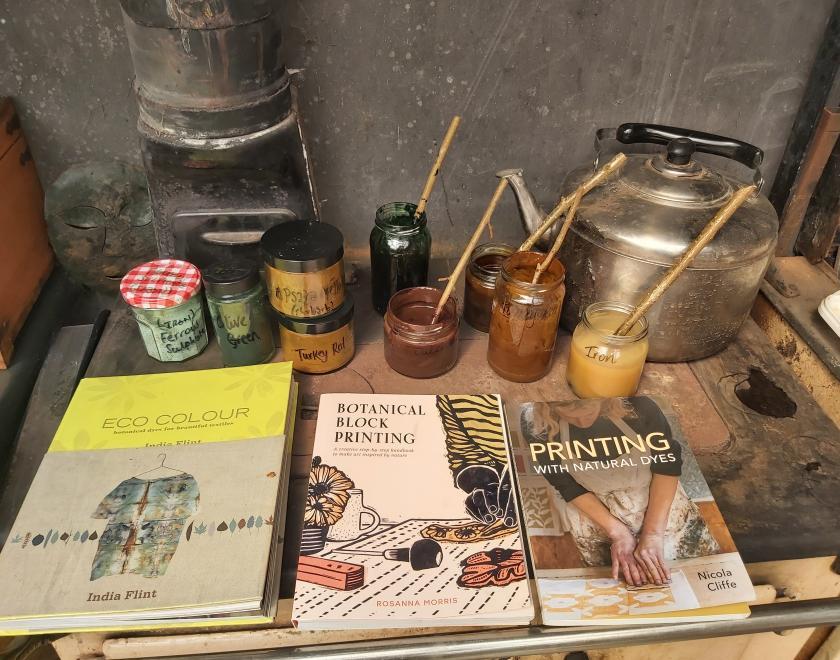A picture of natural dye pastes and books