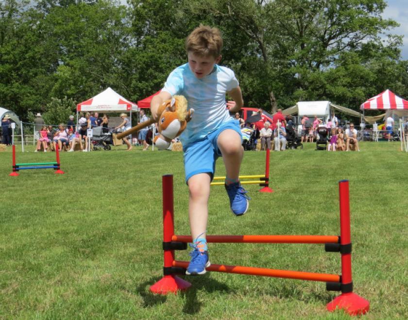 Hobbyhorse jumping at Hurst Show and Country Fayre