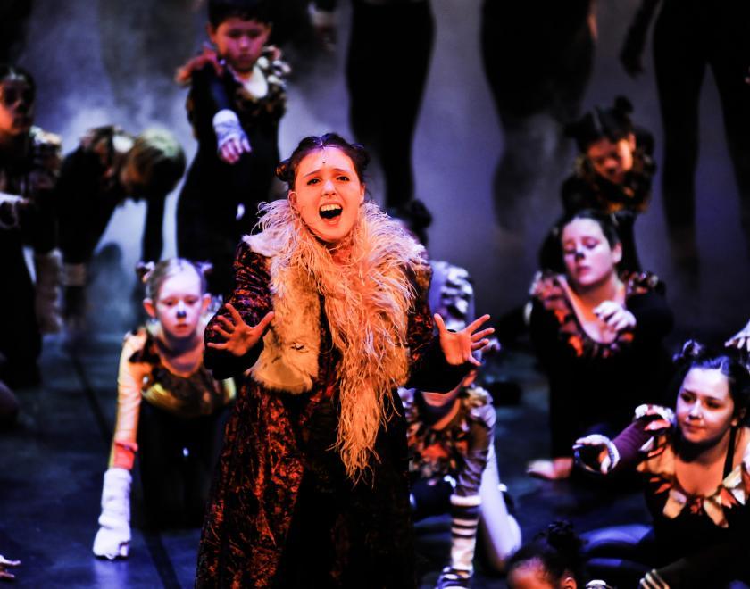 SOTA pupils performing numbers from 'CATS' on stage