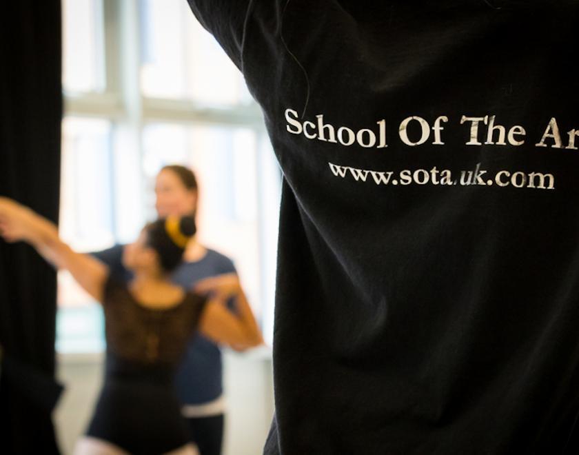 SOTA T-Shirt with dancer in the distance.