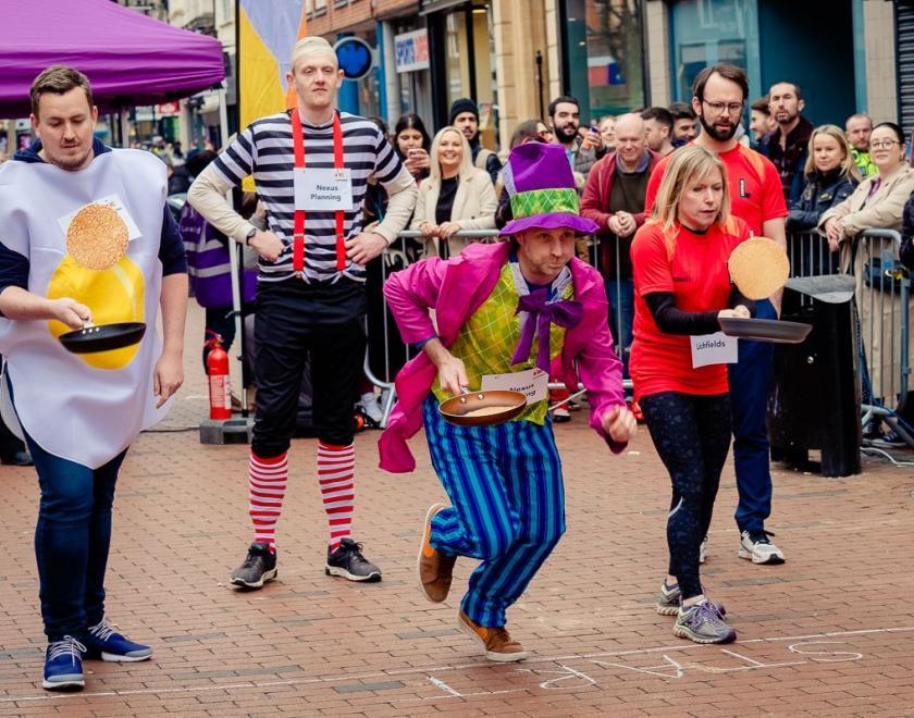 Launchpad’s annual Pancake Race which saw teams batter it out on Broad Street