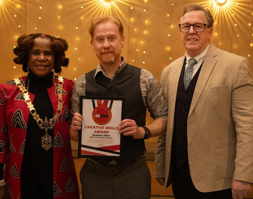 Seamus Allen poses with the Creative Skills Award certificate alongside presenter Nigel Horton Baker and the Mayor of Reading