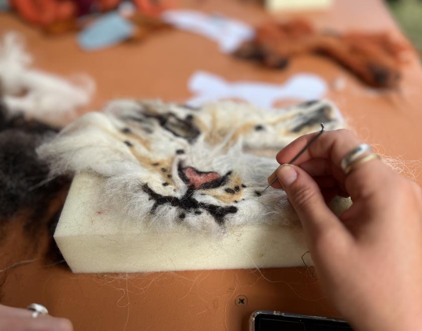 A picture of needle felting and animal mask