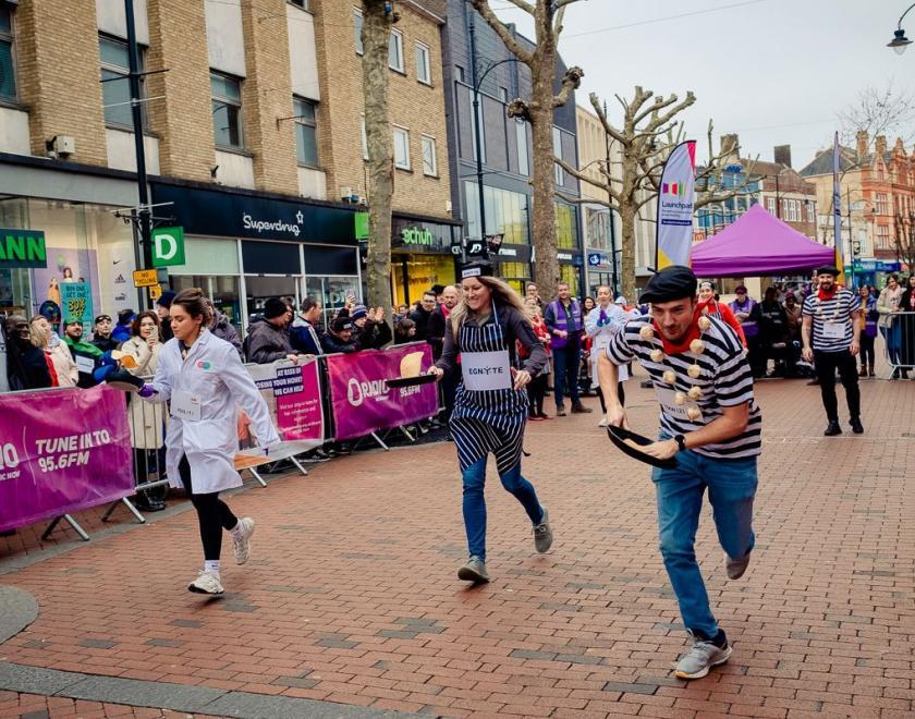 Launchpad’s annual Pancake Race which saw teams batter it out on Broad Street