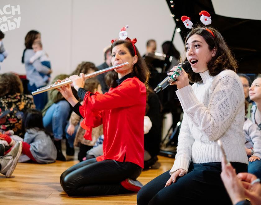 bach to baby players entertain an audience
