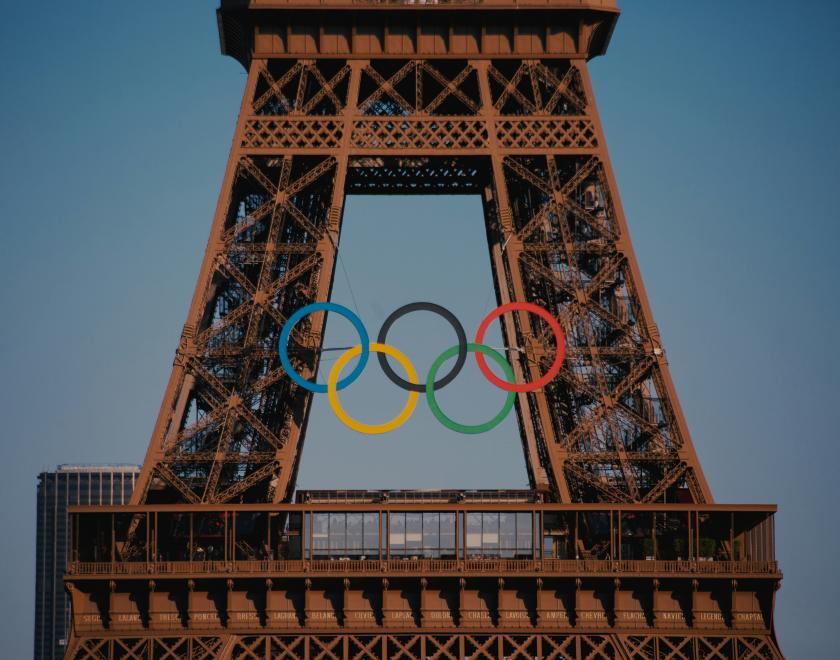 Olympic logo over the Eiffel Tower