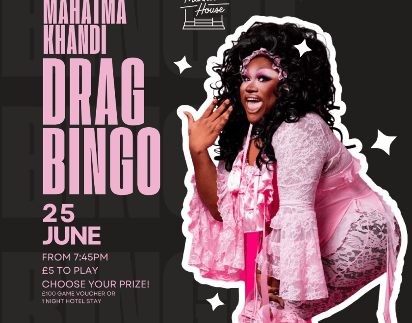 Drag queen in a pink dress, with overly shocked expression