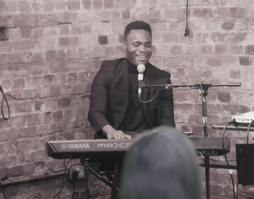 BR James plays piano