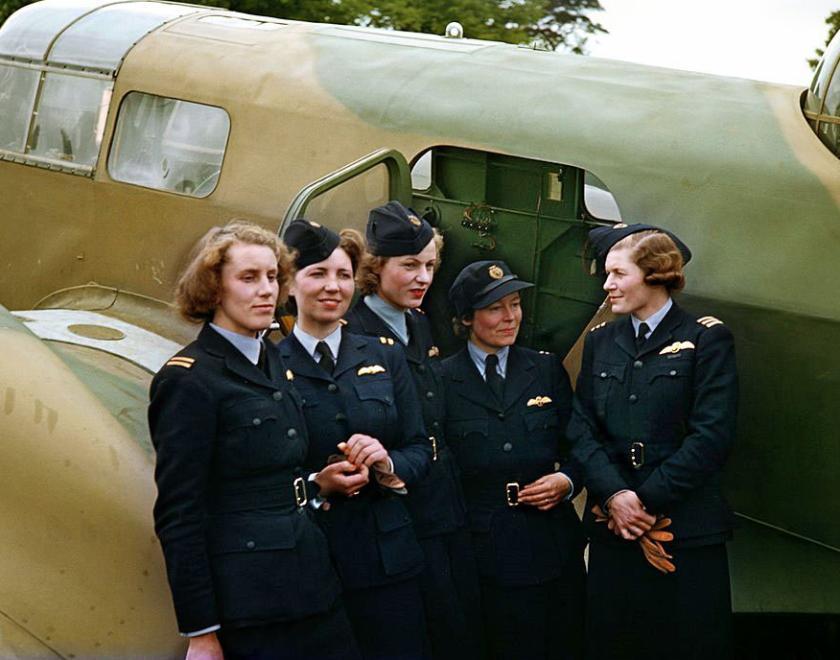 members of the Air Transport Auxiliary in front of a plane
